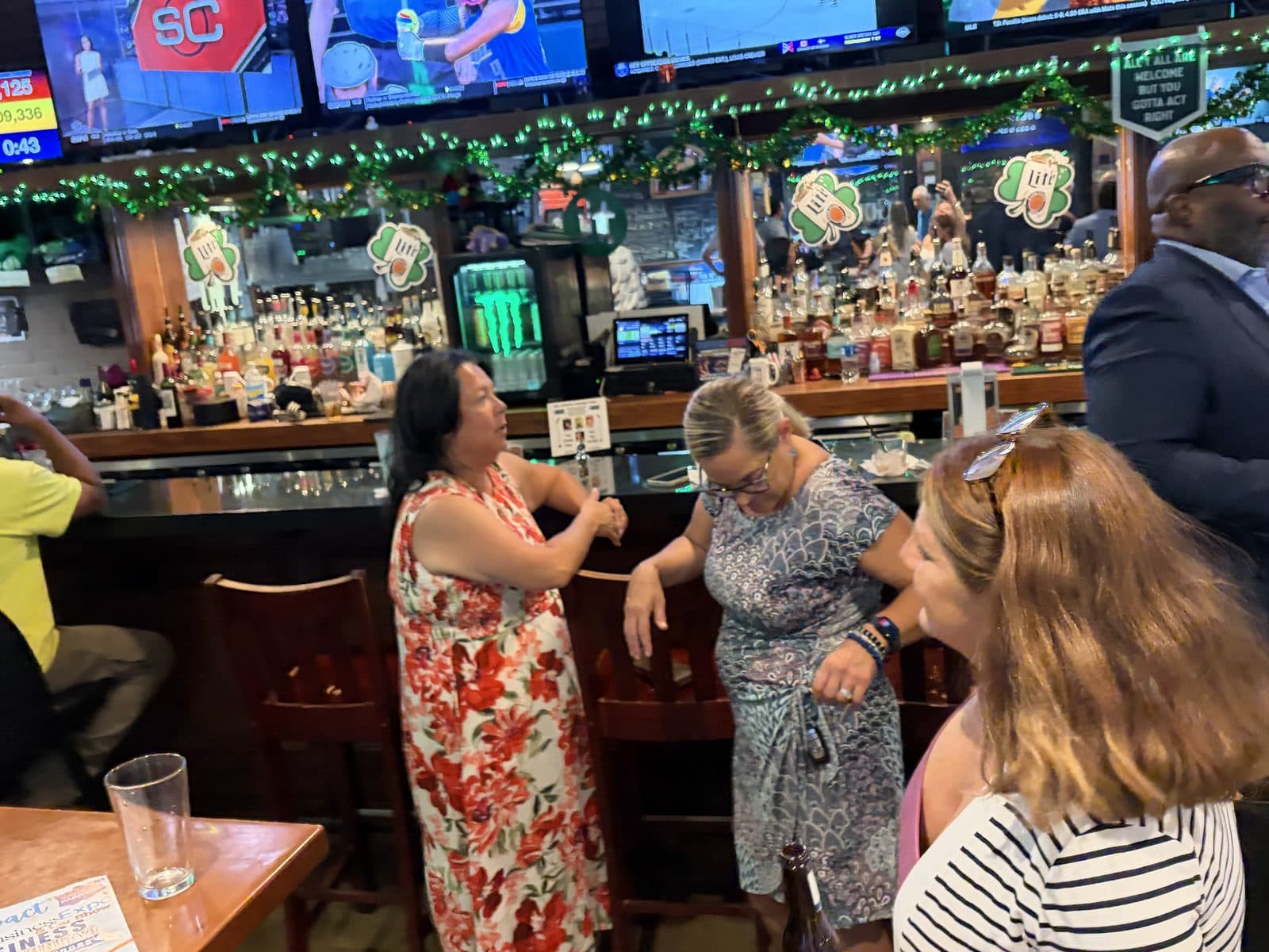 Members catching up along the bar